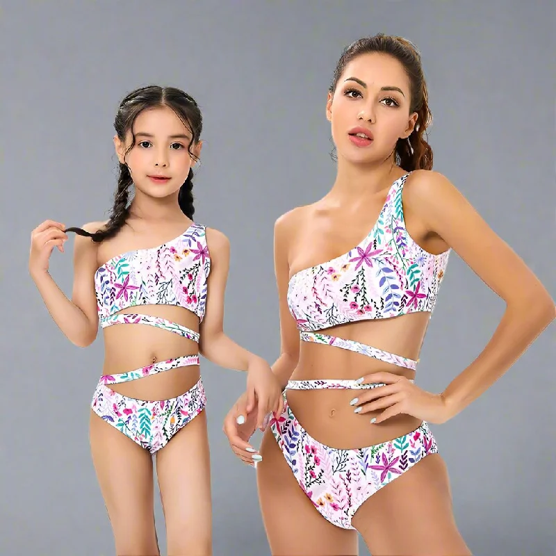 Chic Tropical One-Shoulder Ruffle Swimsuit Set for Mother and Daughter  Vibrant Floral Pattern with Comfort Stretch Mesh Detail Bikini