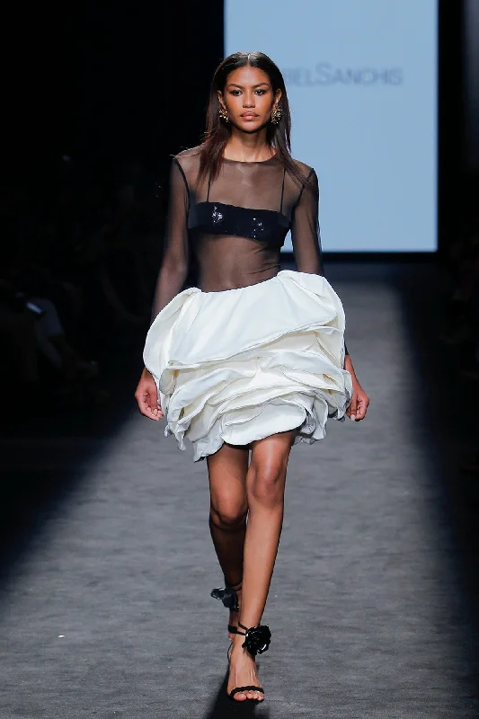 Beaded semi sheer top featuring layered skirt mini skirt trendy